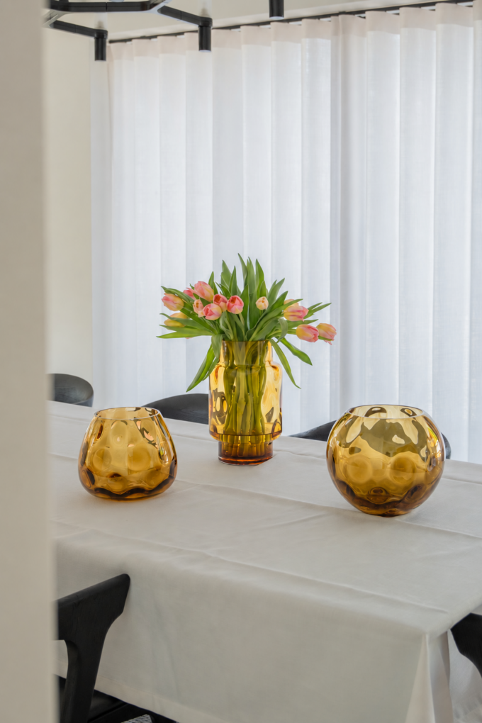 Three luminous amber vases