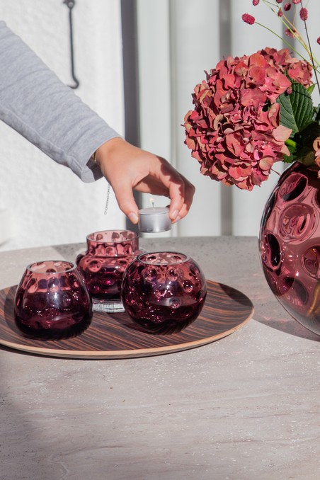 Base round tray styled with Polka candle holders and a vase